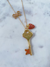 Load image into Gallery viewer, Strawberry and Lotus Seven Key Necklaces

